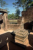 Banteay Srei temple - ruins of a minor building by the side of the causeway